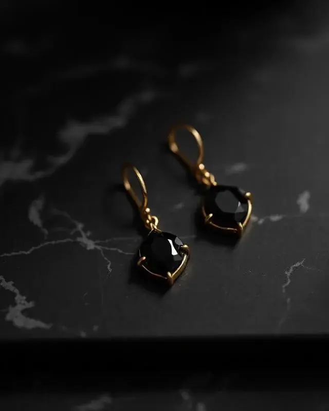 YSNNOIR featured luxury accessories piece 4 — black and gold collection