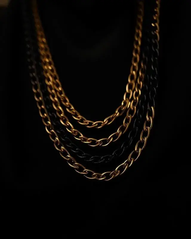 YSNNOIR featured luxury accessories piece 6 — black and gold collection