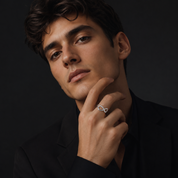Male model wearing silver infinity ring