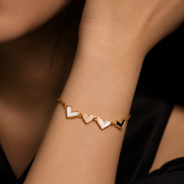 Gold heartbeat bracelet worn on wrist